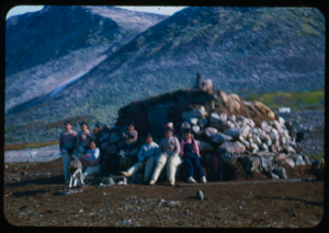Image of Group of Polar Eskimo [Inughuit] women outside sod/stone house