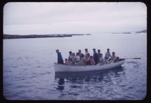 Image of Eskimos [Inuit] in open boat