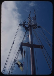 Image of Two crewmen atop rigging
