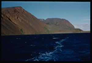 Image of Bowdoin's wake by coastal mountains