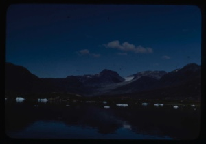 Image of Coastal mountain, glacier, ice, and reflection