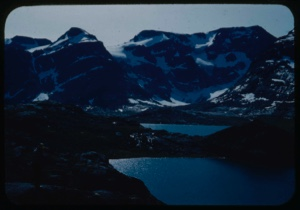 Image of Coastal mountains with snow pockets, and harbor