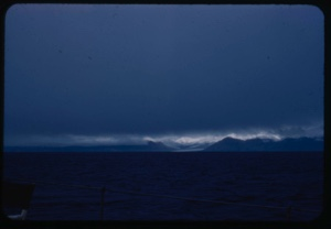 Image of Storm clouds over coast
