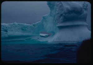 Image: Iceberg with hole, a second iceberg seen through hole