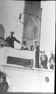 Image of Aboard SS Roosevelt: boy, Bob Bartlett, mayor of Sydney, Peary, and others