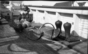 Image of Matthew Henson on sledge aboard SS Roosevelt