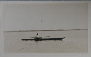 Image of [Donald MacMillan in his kayak]