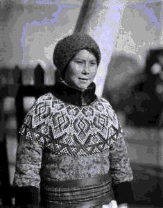 Image of Eskimo [Inuk] woman in dress costume