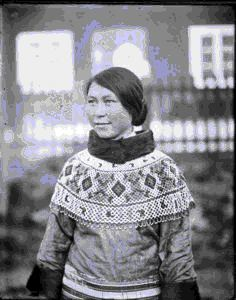 Image of Eskimo [Inuk] woman wearing bead collar