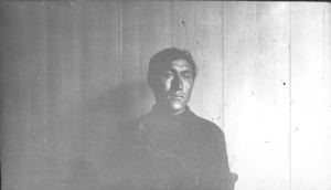 Image of Inuit man, indoors