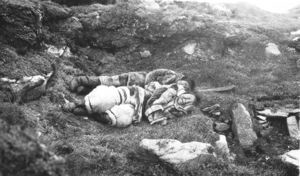 Image: 2 Inuit women lying on grass