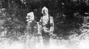 Image of [? and Donald MacMillan in snowy woods]