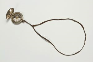 Image of Pocket compass on leather thong