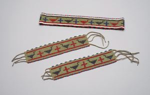 Image: Wristlets with beads in stylized design of birds and crosses
