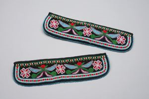 Image: Beaded floral pattern moccasin cuffs with velvet ties attached to one