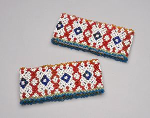 Image: Cuffs with orange, yellow, blue, white, green beads in oval and diamond pattern