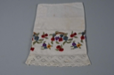 Image of embroidered linen cuff matching 1974.1.16.1