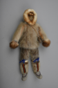 Image of doll in sealskin outfit wtih bead-decorated boots