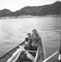 Image of Eskimo [Inuit] children and women in open boat, Lichtenfel