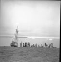 Image of Eskies [Inuit] on beach