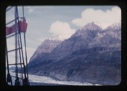 Image of coastal mountains through rigging