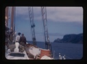 Image of crew looking at mountains from bow