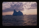 Image of Iceberg and sunlit clouds, entrance to Gulf of St. Lawrence