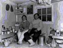 Image of Sorkak and wife in igloo [iglu]