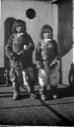 Image of Two Eskimo [Inuit] boys on deck