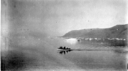 Image of Eskimos [Inuit] in an open boat; ice floes beyond