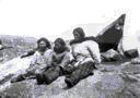 Image of Eskimos [Inuit] in settlement