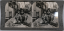 Image of stereo view card: Eskimo [Inuit] woman preparing a skin