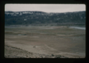 Image of View of raised delta, Centrum Lake. 2 men exploring orientation of runway