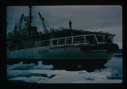 Image of Icebreaker USCG Westwind, lands Air Force research team plus equipment by LCVP 