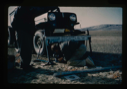 Image of Field soil engineering tests, using jeep for loading.