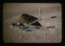 Image of Test pit on runway, Bronlunds Fjord, showing equipment for different soil tests