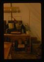 Image of View of well-organized kitchen section of tent.