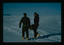 Image of Laying out seismic cable in North Star Bay on sea ice near Thule AFB.