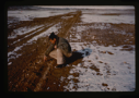 Image of Soils engineer checks rut depth on Polaris Promontory runway after C-130 lands