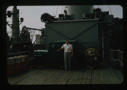 Image of Needleman runs jeep engine daily on back deck of USS Atka, icebreaker