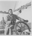 Image of Stanton Cook at the Wheel of the BOWDOIN