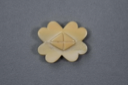 Image of Ivory pin, four-leaf clover shape with a cross in center