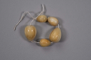 Image of Five tear drop shaped ivory beads