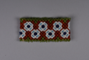 Image of Beaded child's cuff with circle pattern in orange, green, white, blue