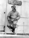 Image of Donald MacMillan in foul weather gear on S.S. Peary