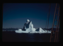 Image of Iceberg with shadows, seen through rigging