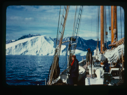 Image of Icebergs throught rigging; Miriam MacMillan on deck