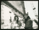 Image of Miriam and Donald MacMillan with Kahda and Alhningwah on the schooner Bowdoin