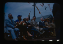 Image of Speakers' Platform on Departure Day. Seated include naval officers, ?, Lowell Th