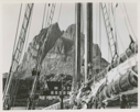 Image of Home and mountain through rigging on schooner Bowdoin